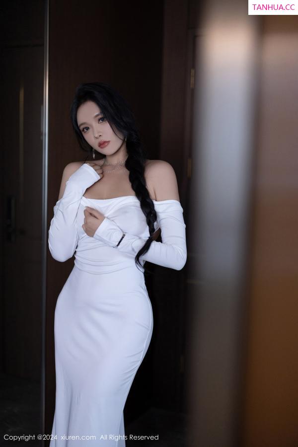 小娜比  [XiuRen]高清写真图 2024.09.05 No.9115 娜比 黑丝美腿第16张图片